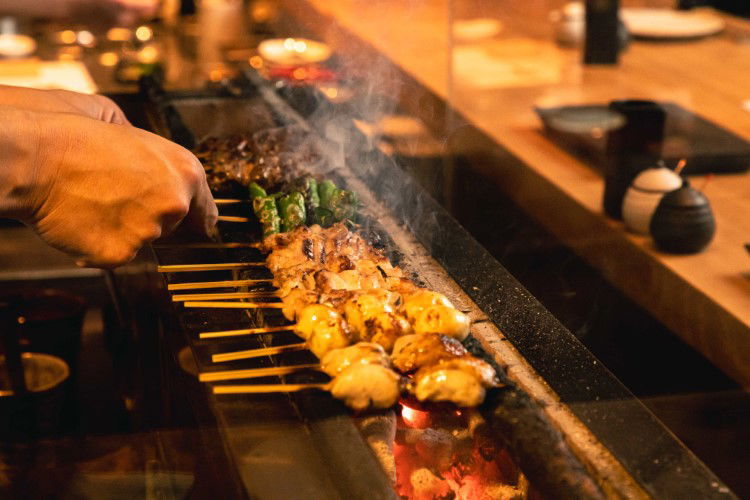 A selection of yakiniku being grilled at Yakitori Ruike.