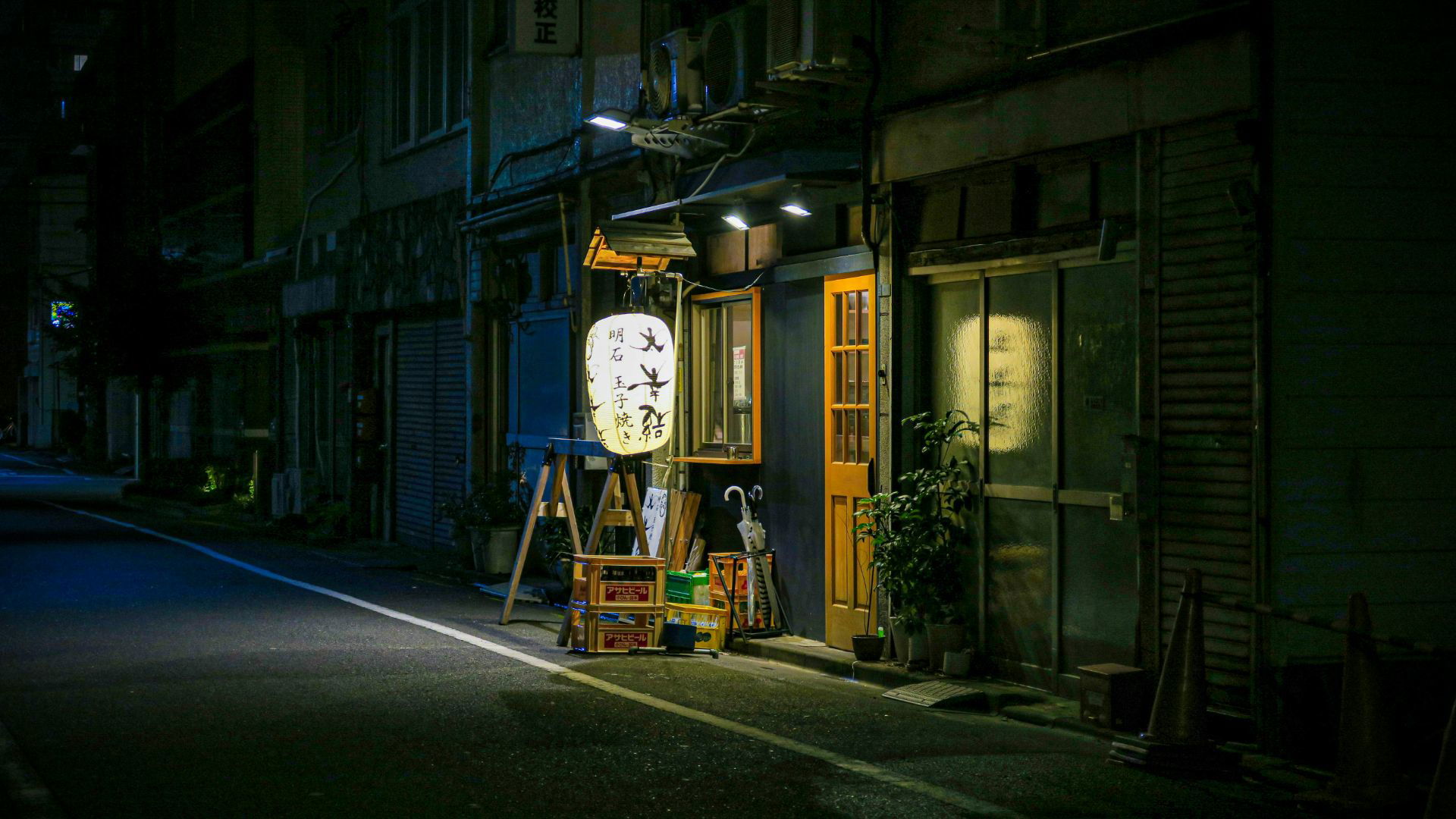 Cozy Japanese street view with illuminated restaurant lantern