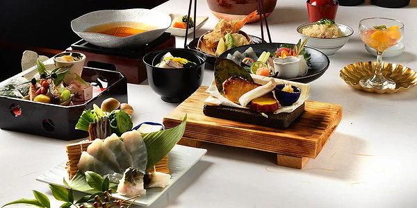 Elegant Japanese cuisine spread with sushi, sashimi, and tempura