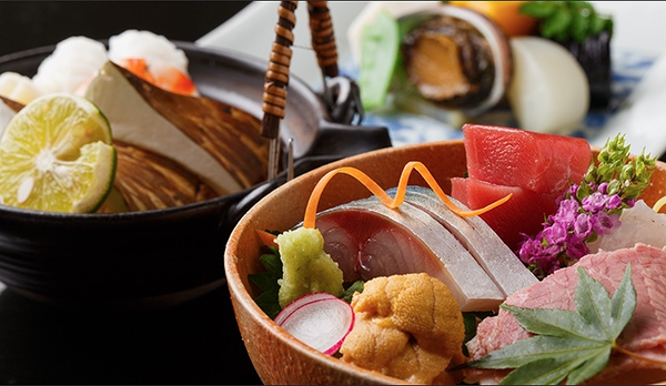 Vibrant platter of fresh sashimi with lime garnish