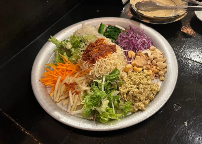 A top-down shot of Vietnamese food at Yoyonam, showing a mix of colorful ingredients.