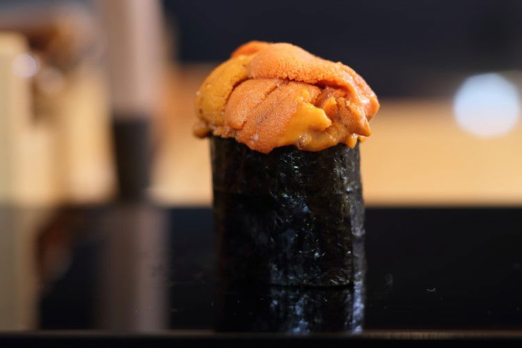 Generously uni-topped gunkan sushi served at Hozenji Sushidokoro Nakatani.