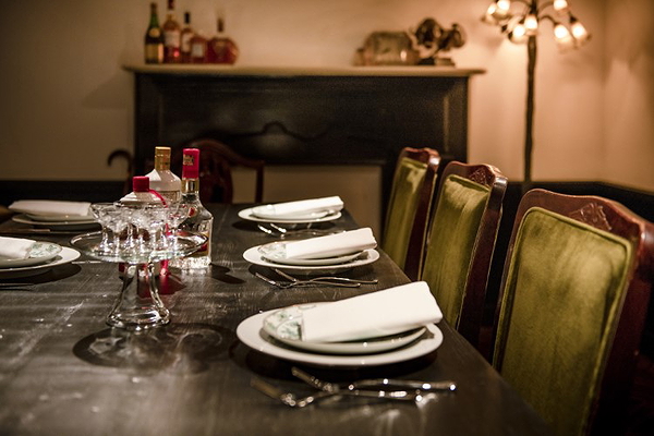 Elegant dining table with classic decor in cozy restaurant setting