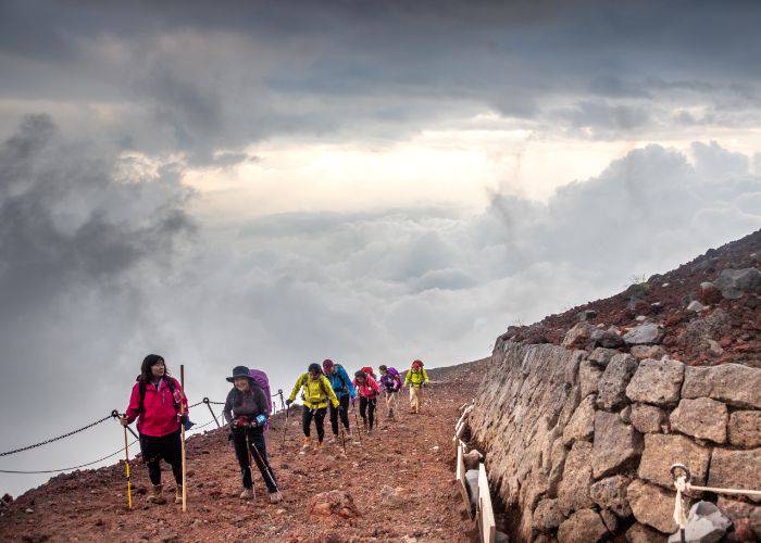 Hikers climb Mt. Fuji in Japan