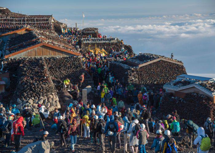 A crowd of hikers at one of the stations on Mt. Fuji