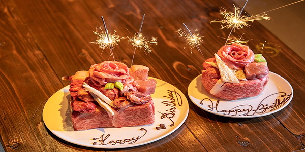 Sparkling birthday beef platters on a wooden table