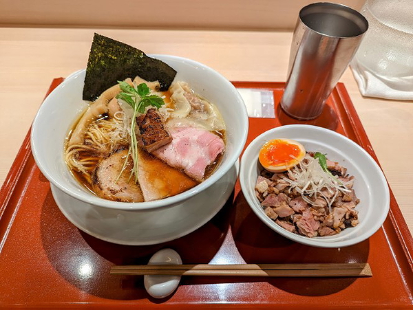 Delicious Japanese ramen and rice bowl on a restaurant tray