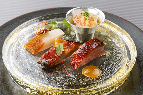 Gourmet dish with glazed meat and elegant presentation