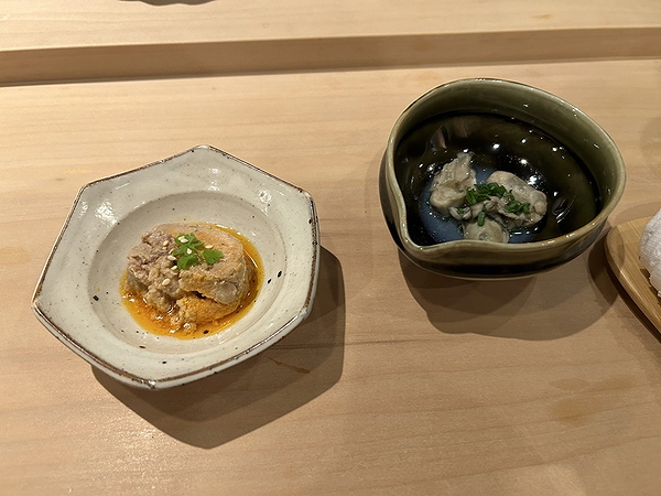 Gourmet seafood dishes served on elegant ceramic bowls