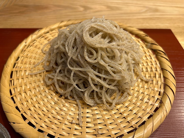 Traditional Japanese soba noodles on bamboo mat