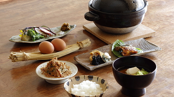 Traditional Japanese dishes arranged on a wooden table