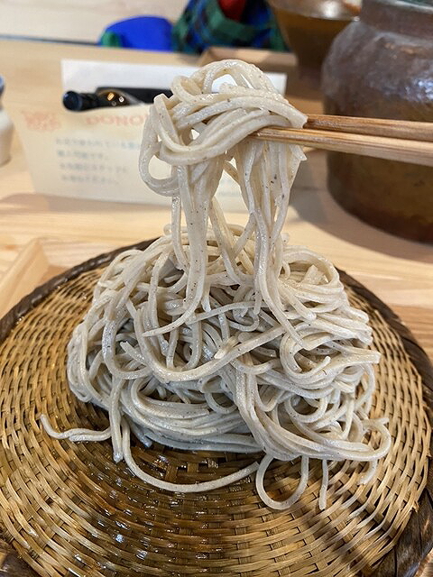 Traditional soba noodles in bamboo basket at a Japanese restaurant