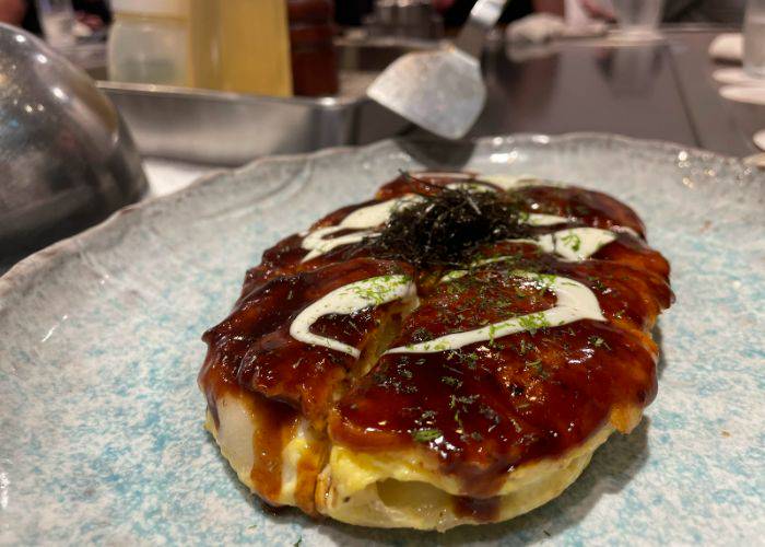 A plating of sauce-covered okonomiyaki at Jibundoki.
