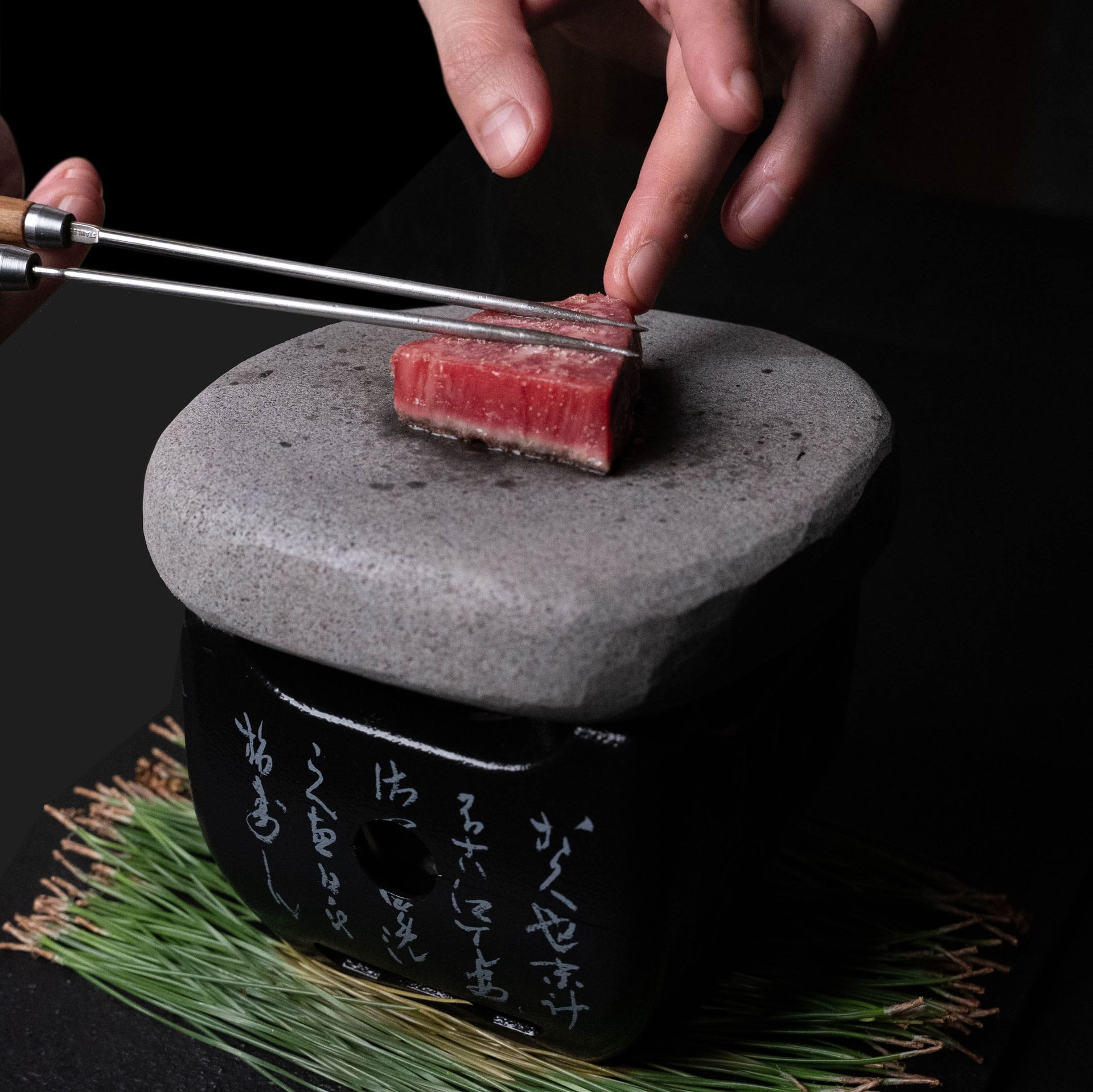 A delicate, precise cut of wagyu beef at Yakiniku Kappo Note.