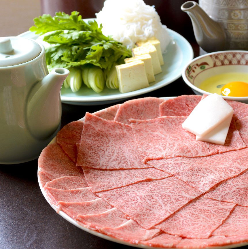 Authentic Japanese Sukiyaki meal ingredients on display