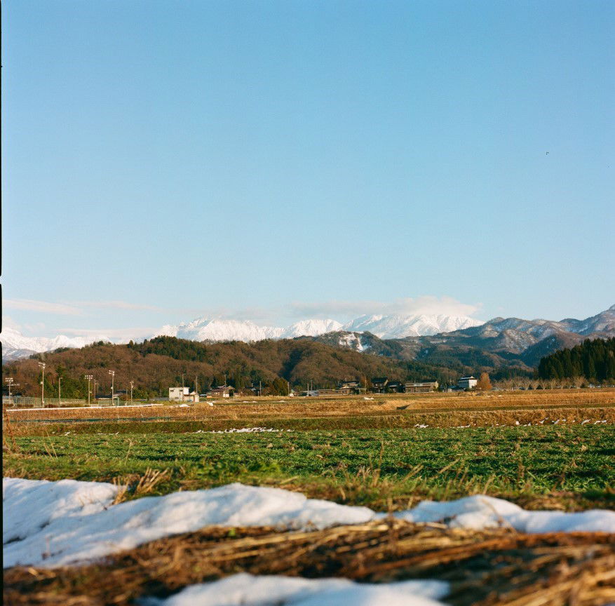 The bright blue skies and towering mountains of Toyama, as seen on this Toyama food tour.