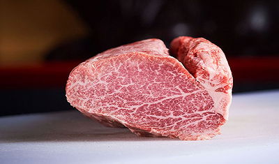 Prime Wagyu beef steak with rich marbling on a restaurant cover image