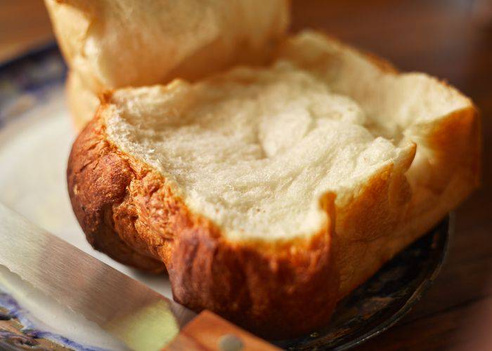 A slice of soft, fluffy Japanese milk bread.