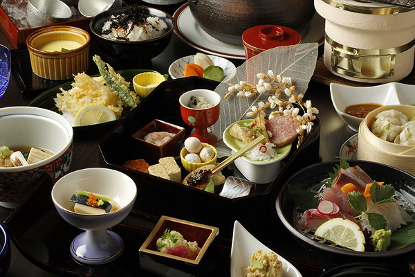 Gourmet Japanese cuisine with assorted dishes and traditional presentation.