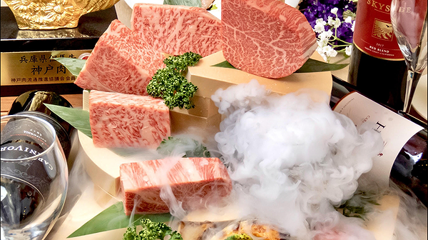 Premium marbled Wagyu beef with wine and misty presentation