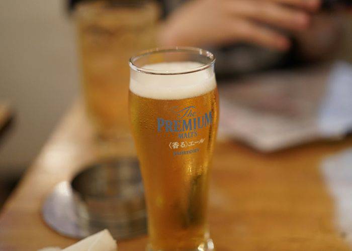 A glass of beer at an izakaya in Tokyo.