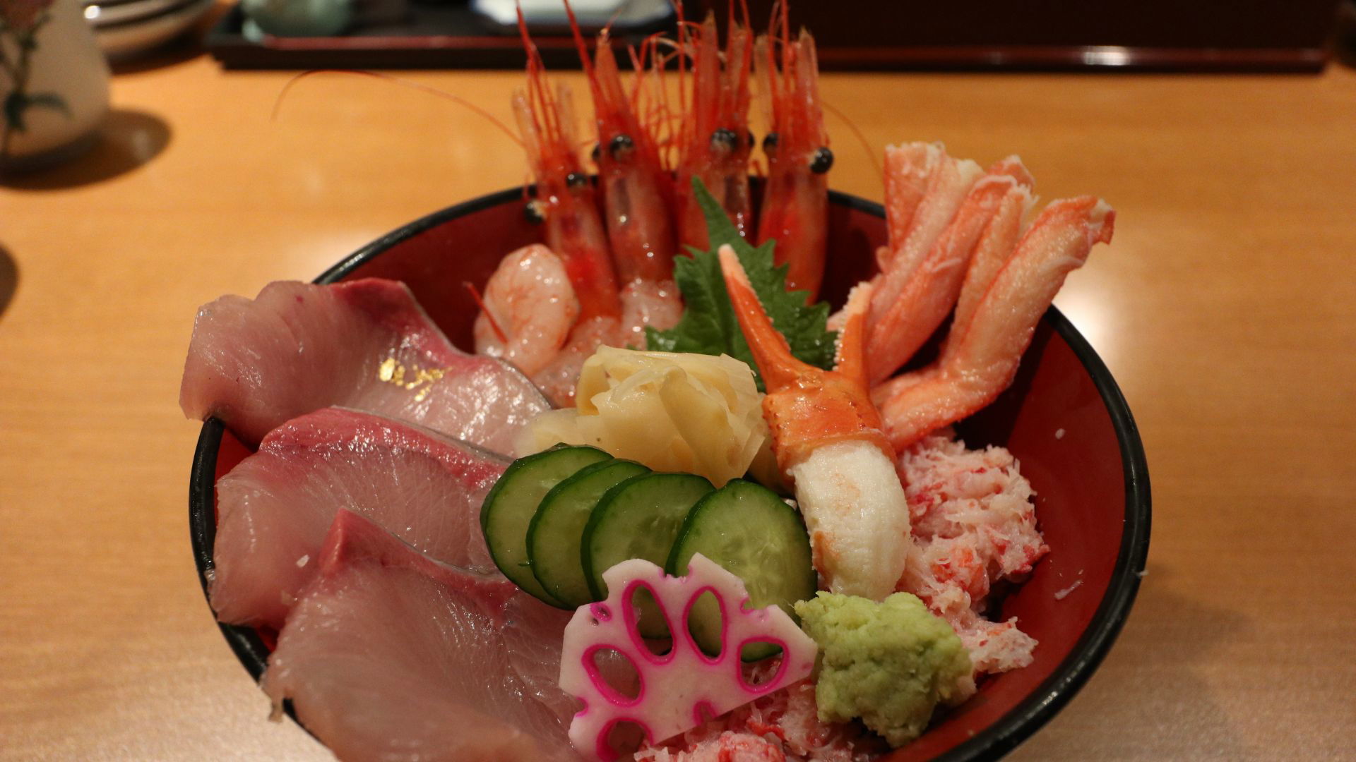 Authentic sashimi bowl with fresh seafood and garnishes