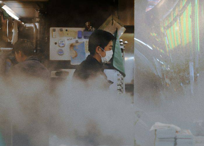 A steamy food stall in Kanazawa's Omicho Market.