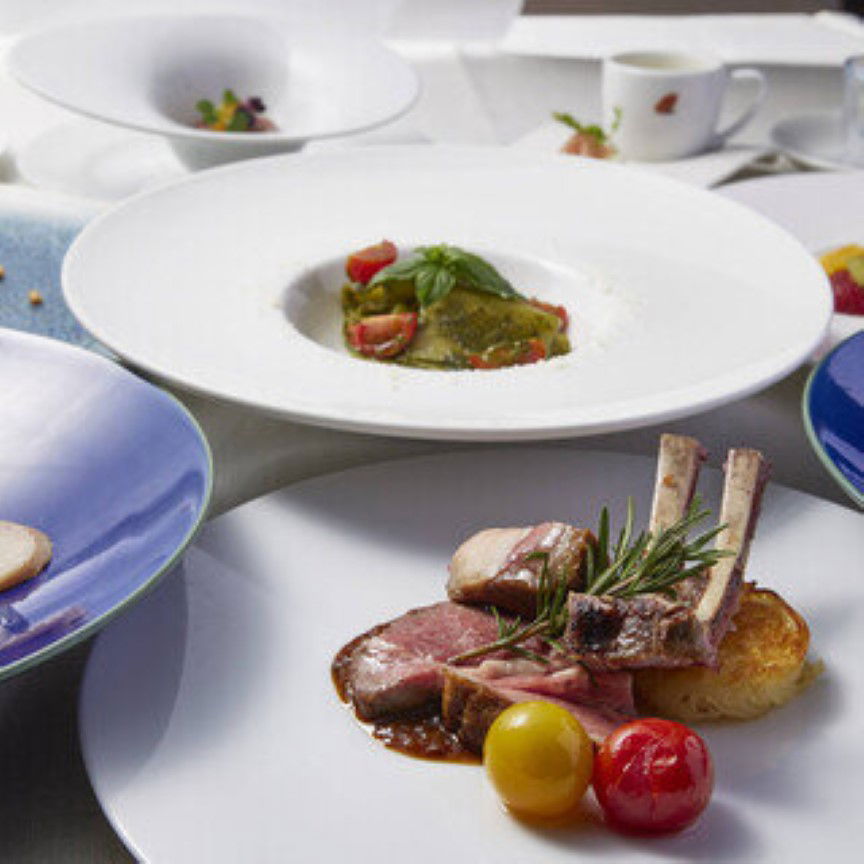 Exquisite gourmet course menu with lamb chops and vegetable dish