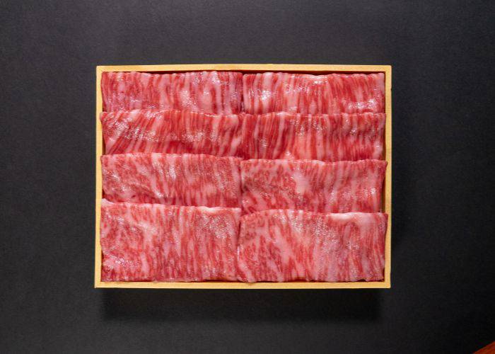 Premium Japanese wagyu beef, packed into a box in four thick slabs.