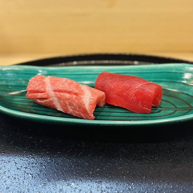 Two fresh seafood nigiri at Sushi Iwa.