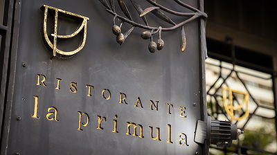 Elegant restaurant sign for Ristorante La Primula in Italy
