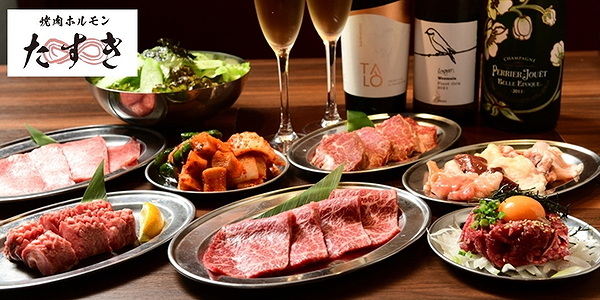 Assorted premium meats and champagne at upscale grill restaurant