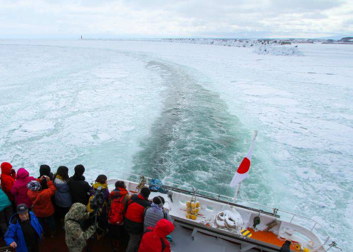 A filled bowl traveling through drift ice on the Drift ice in Shiretoko Peninsula.