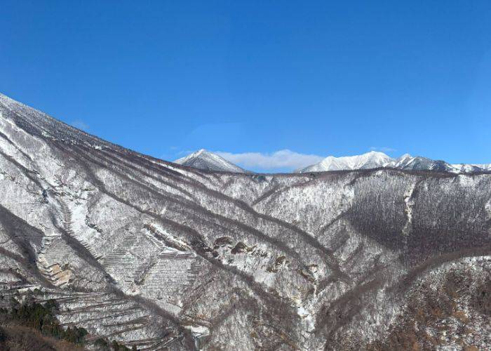 Snow-covered mountains create a spectacular horizon in Nikko.