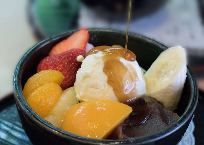 Anmitsu: mochi, red bean paste, fresh fruits and syrup.