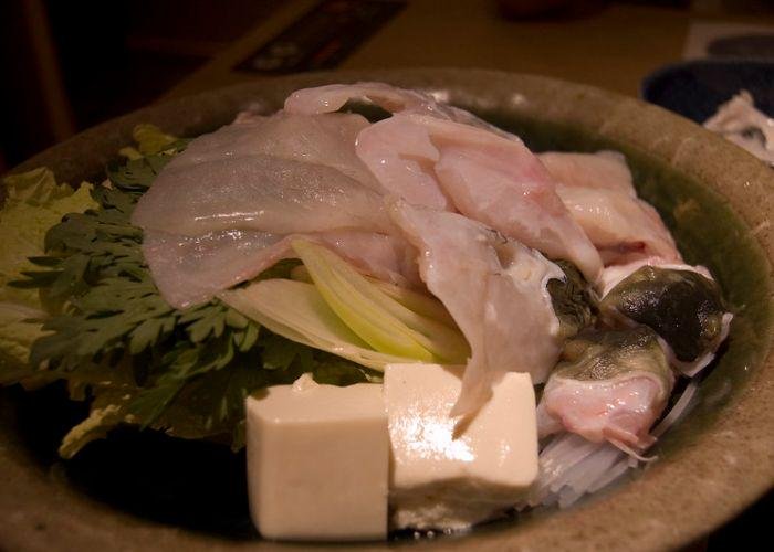 Fugu hot pot with raw fugu blowfish