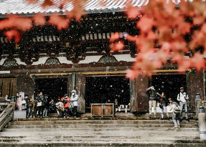 Kyoto's Jingoji Temple during the winter, dusted with snow.