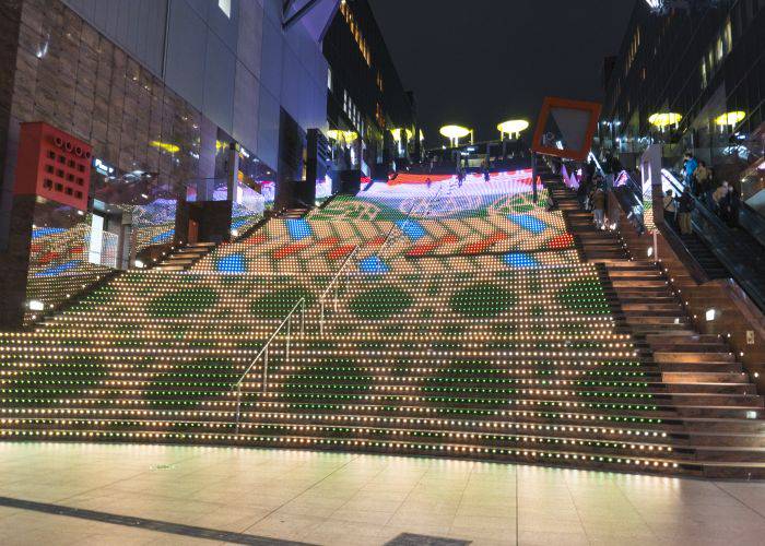 The unique Kyoto Station illuminations, lighting up the station's steps with festive light shows.