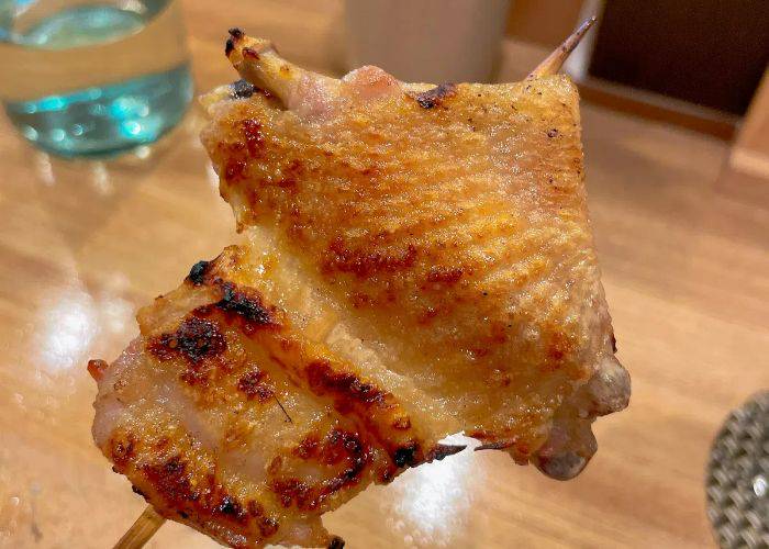 A juicy, generous chicken skewer at Yakitori Kita.