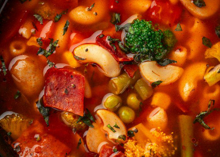 A hearty minestrone soup, filled with beans, broccoli, tomatoes and pasta. 