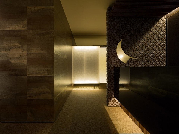 Elegant restaurant interior with modern lighting and sleek design