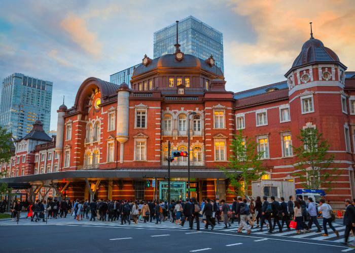 The glorious red-brick exterior of Tokyo Station as the sun begins to set.