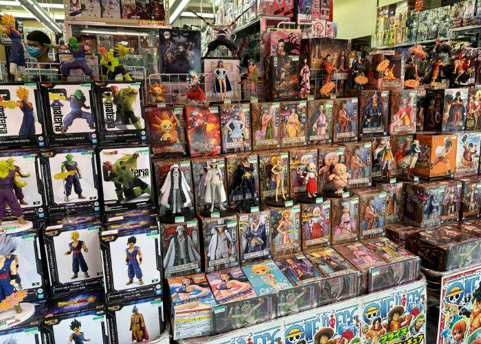 Shelves filled with manga and anime figurines at Mandarake.