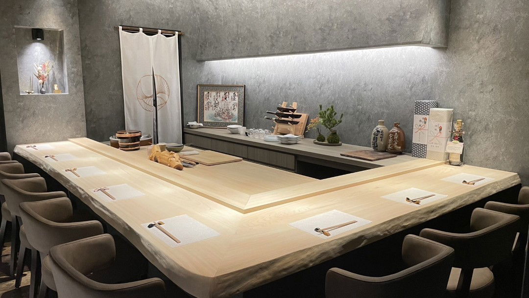 The sleek, modern counter seating of Sushi Taiga.