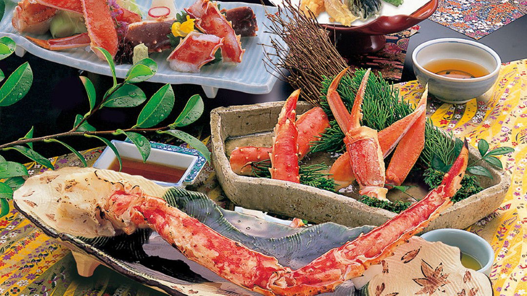 Exquisite Japanese seafood platter with king crab legs and sashimi