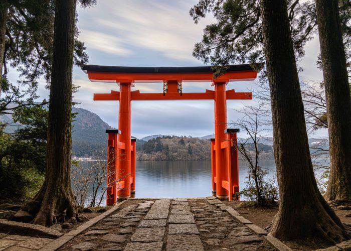 A torii gate overlooking Lake Ashi in Hakone