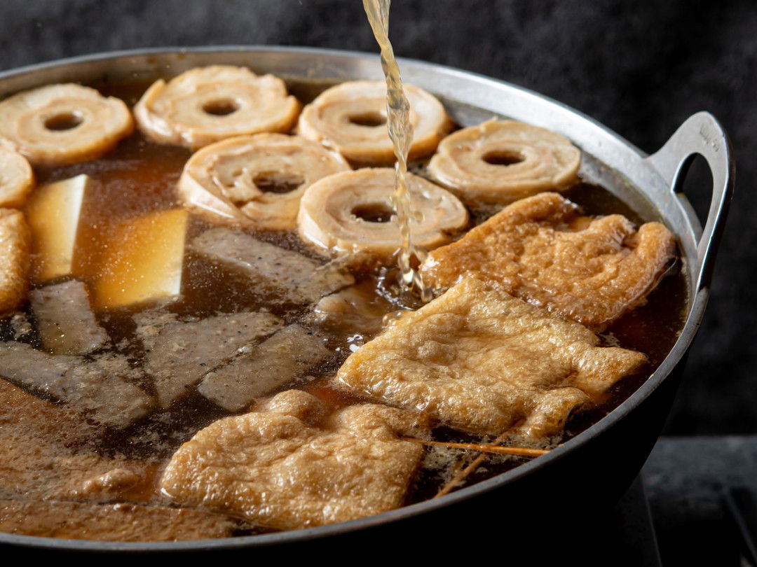 A bowl of oden, filled with warming ingredients and dashi broth.