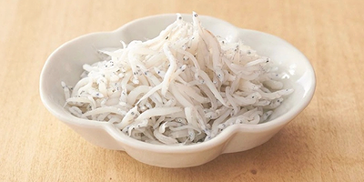 Fresh shirasu in a white bowl, a Japanese seafood delicacy