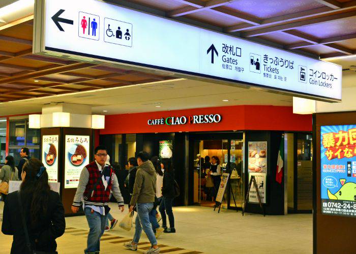 A CAFFE CIAO PRESSO in a train station in Japan.