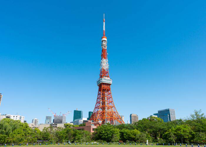 Tokyo Tower set against a blue sky.